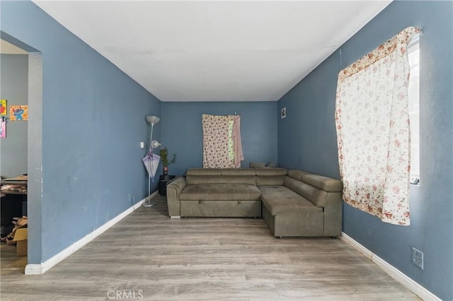 907 E 109th Pl, Los Angeles, CA 90059 - living area featuring baseboards and wood finished floors