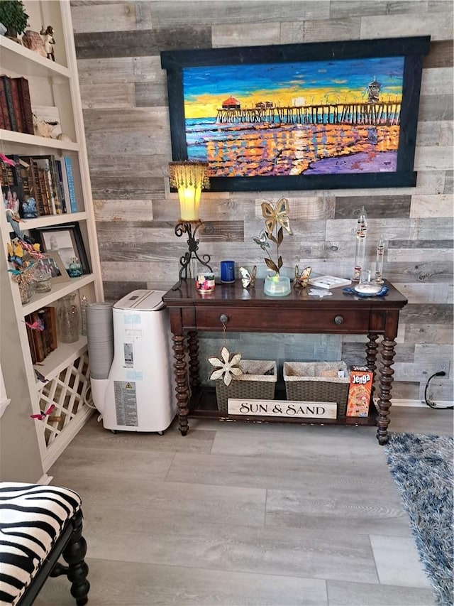room details with wood walls and wood finished floors