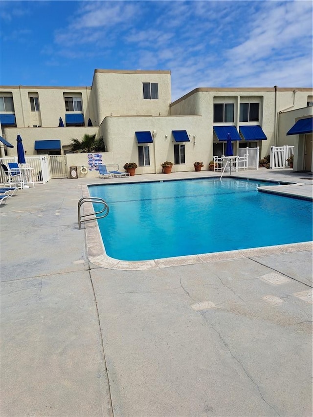 711 Pacific Coast Hwy Unit 418, Huntington Beach, CA 92648 - community pool featuring a patio