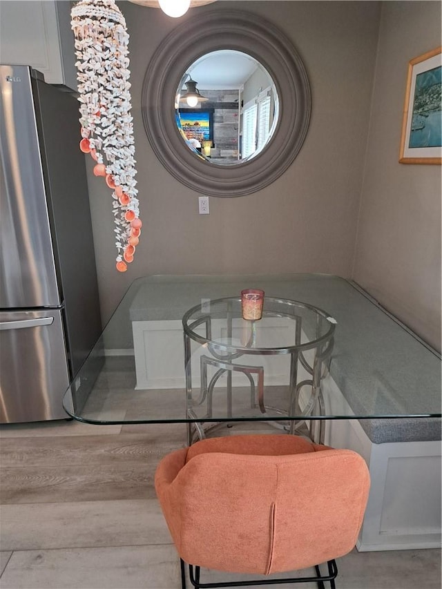 711 Pacific Coast Hwy Unit 418, Huntington Beach, CA 92648 - dining room with wood finished floors