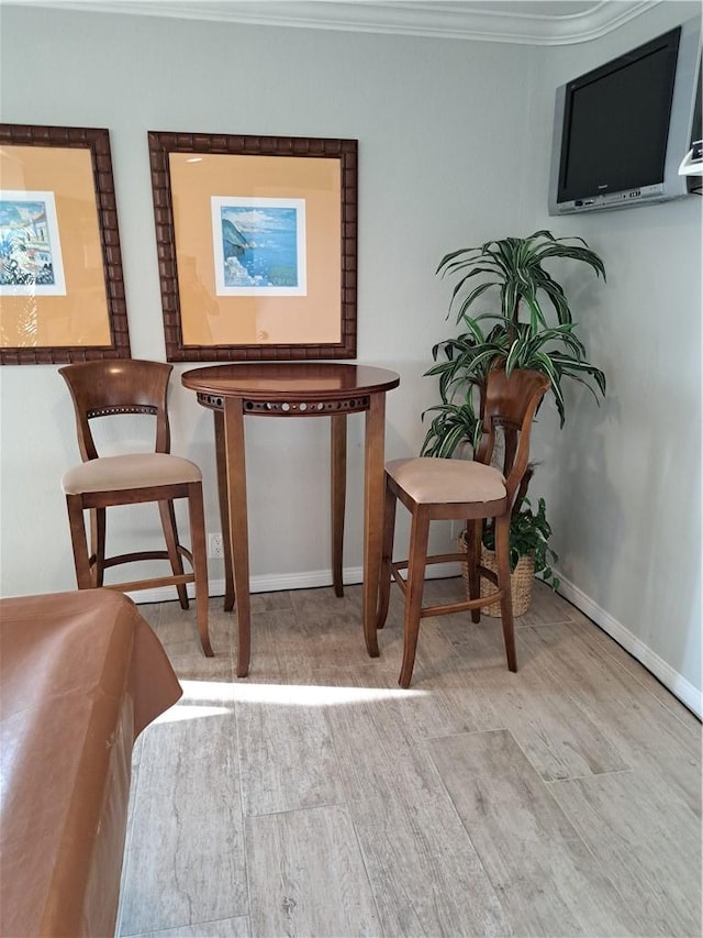 711 Pacific Coast Hwy Unit 418, Huntington Beach, CA 92648 - living area with wood finished floors and crown molding