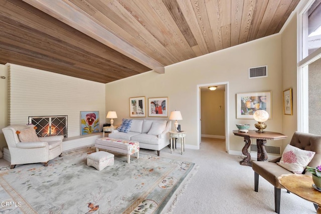 living area featuring wooden ceiling, baseboards, carpet flooring, and visible vents