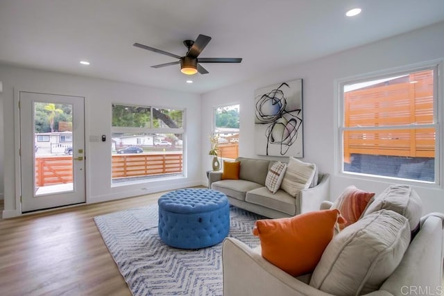 living room featuring wood finished floors, recessed lighting, and ceiling fan