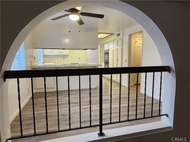 4872 Emerald Ave, La Verne, CA 91750 - interior space with a sink, visible vents, wood finished floors, and baseboards