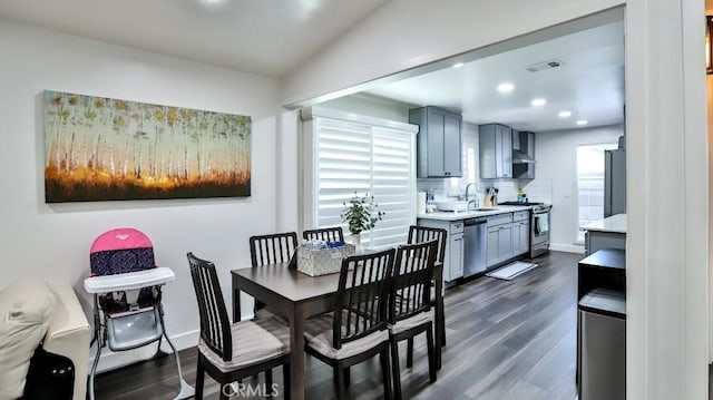 10301 Antigua St, Anaheim, CA 92804 - dining area with dark wood-style floors, baseboards, and recessed lighting