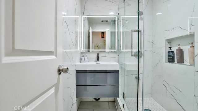 10301 Antigua St, Anaheim, CA 92804 - bathroom with a marble finish shower and vanity
