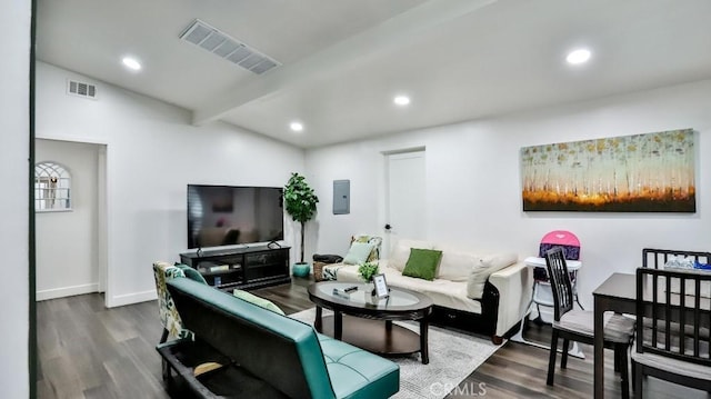10301 Antigua St, Anaheim, CA 92804 - living area with visible vents, vaulted ceiling with beams, and dark wood-type flooring