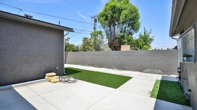 10301 Antigua St, Anaheim, CA 92804 - view of yard with a fenced backyard and a patio area