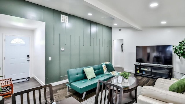10301 Antigua St, Anaheim, CA 92804 - living area with recessed lighting, visible vents, wood finished floors, and baseboards