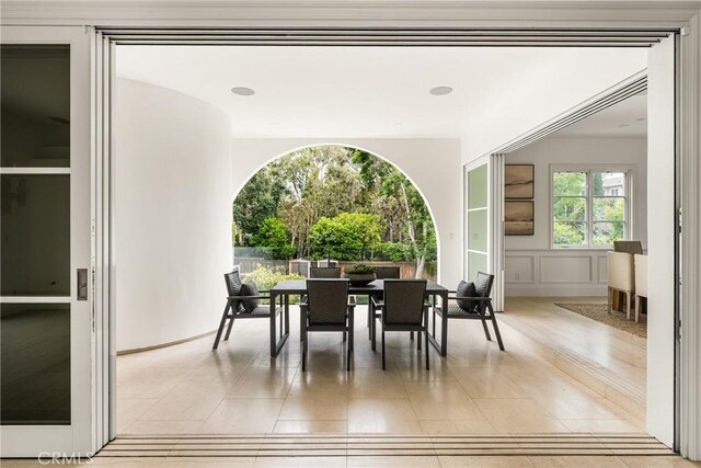 view of patio / terrace featuring fence and outdoor dining area