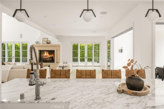 interior space with french doors and a sink