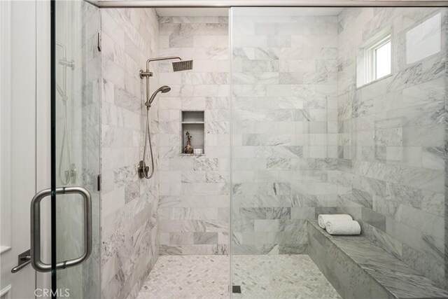 full bathroom featuring a stall shower