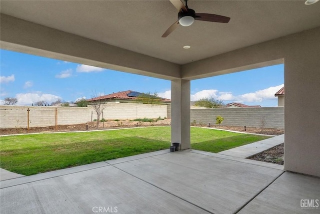 view of patio featuring a ceiling fan and a fenced backyard