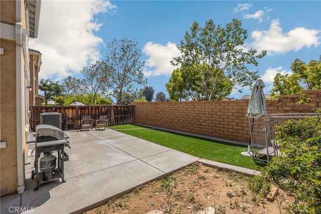 view of patio with central AC and a fenced backyard