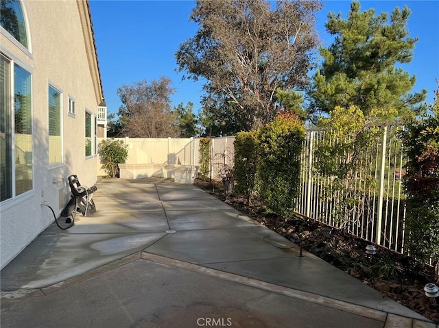 22810 Mountain Ash Cir, Corona, CA 92883 - view of patio / terrace featuring a fenced backyard