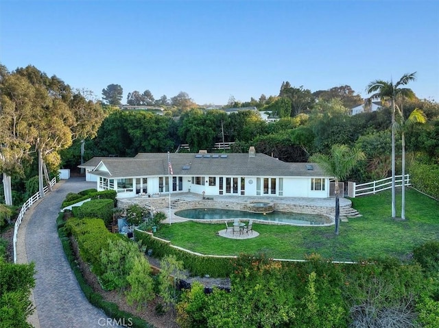 12 Bowie Rd, Rolling Hills, CA 90274 - back of house with a patio area, french doors, a pool with connected hot tub, and a shingled roof