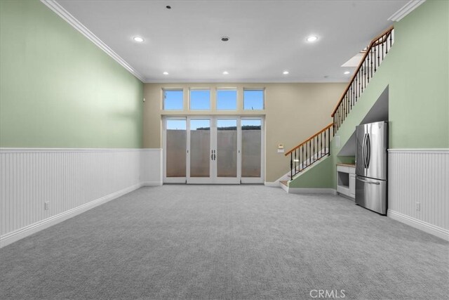 12 Bowie Rd, Rolling Hills, CA 90274 - unfurnished living room featuring carpet flooring, crown molding, stairway, wainscoting, and recessed lighting