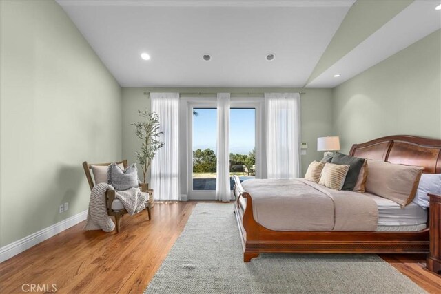 12 Bowie Rd, Rolling Hills, CA 90274 - bedroom with lofted ceiling, access to exterior, light wood-style floors, and recessed lighting