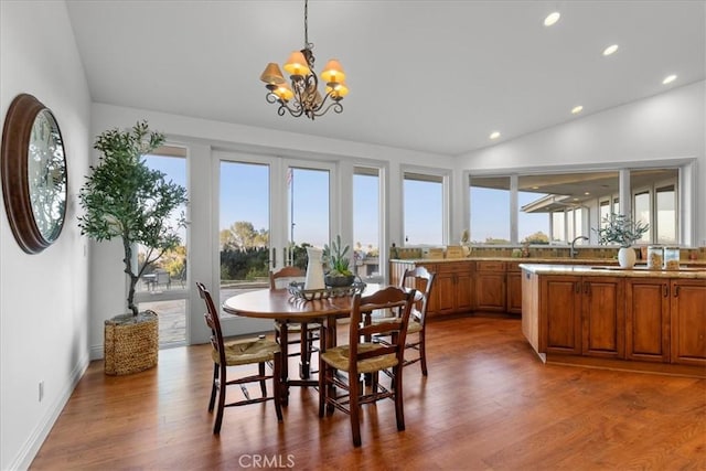 12 Bowie Rd, Rolling Hills, CA 90274 - dining space featuring vaulted ceiling, healthy amount of natural light, a chandelier, wood finished floors, and recessed lighting