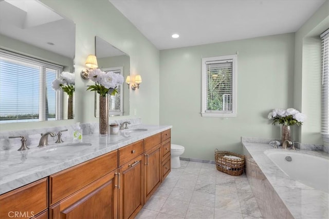 12 Bowie Rd, Rolling Hills, CA 90274 - bathroom featuring a bath, double vanity, toilet, baseboards, and recessed lighting