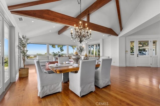 12 Bowie Rd, Rolling Hills, CA 90274 - dining room featuring a chandelier, beamed ceiling, wood finished floors, healthy amount of natural light, and recessed lighting