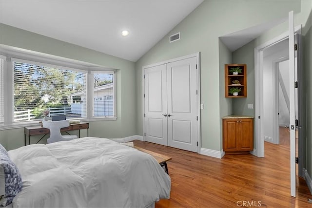 12 Bowie Rd, Rolling Hills, CA 90274 - bedroom with light wood-style flooring, a closet, vaulted ceiling, baseboards, and recessed lighting