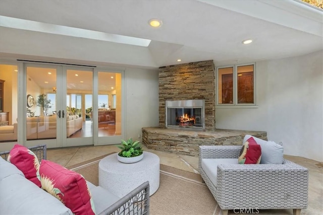 12 Bowie Rd, Rolling Hills, CA 90274 - living room with a fireplace, recessed lighting, and french doors