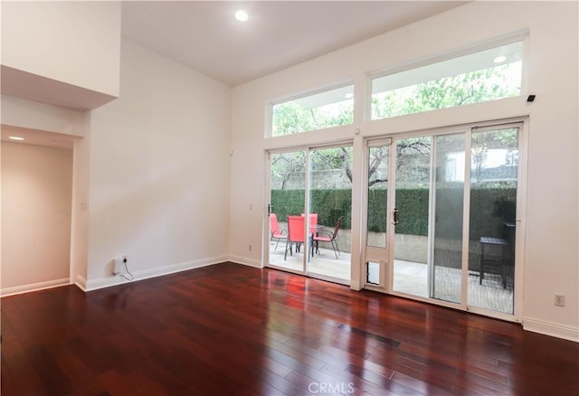 1020 Hilldale Ave, West Hollywood, CA 90069 - interior space featuring wood-type flooring, a high ceiling, baseboards, and a healthy amount of sunlight