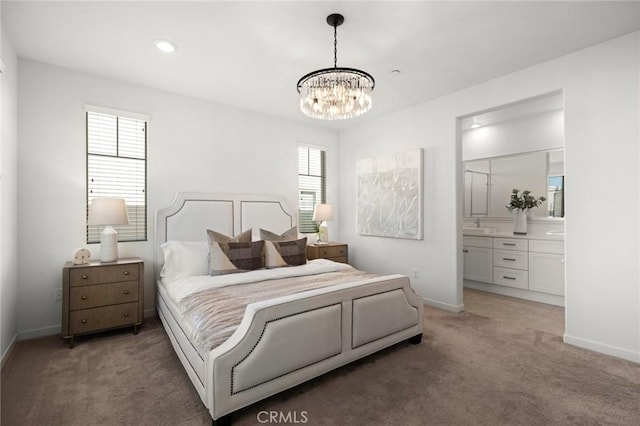 139 Terrapin, Irvine, CA 92618 - bedroom with a chandelier, connected bathroom, baseboards, and light carpet
