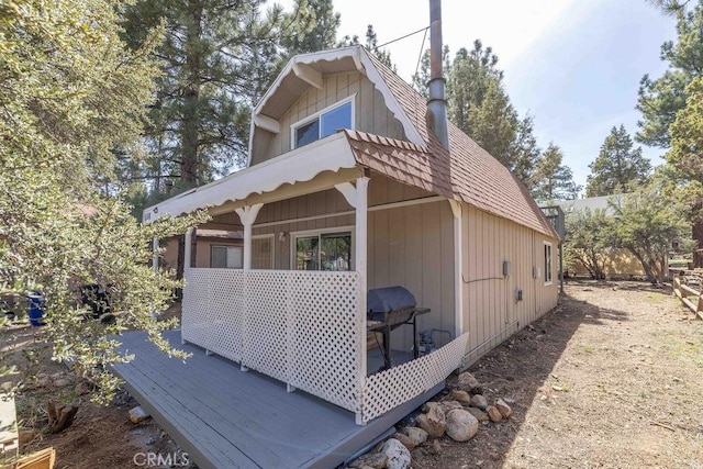 550 Pine Ln, Sugarloaf, CA 92386 - view of home's exterior with a deck