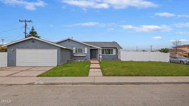 309 W Rosa St, Oxnard, CA 93033 - ranch-style home featuring fence, a front lawn, concrete driveway, and an attached garage