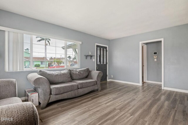 309 W Rosa St, Oxnard, CA 93033 - living room with baseboards and wood finished floors