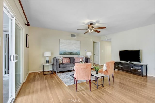 927 Alta Loma Dr, Corona, CA 92882 - living area featuring light wood-style flooring and a ceiling fan