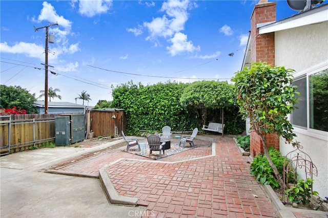 927 Alta Loma Dr, Corona, CA 92882 - view of patio / terrace featuring an outdoor fire pit