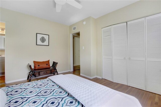 927 Alta Loma Dr, Corona, CA 92882 - bedroom featuring wood finished floors, a closet, and ceiling fan