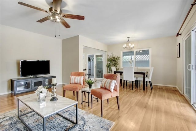 927 Alta Loma Dr, Corona, CA 92882 - living area featuring a chandelier, light wood-style flooring, and ceiling fan