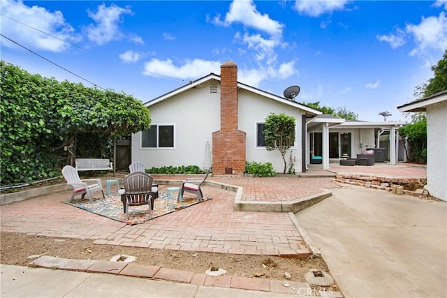 927 Alta Loma Dr, Corona, CA 92882 - view of patio / terrace featuring an outdoor fire pit
