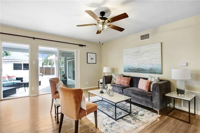 927 Alta Loma Dr, Corona, CA 92882 - living area featuring wood finished floors and ceiling fan
