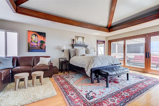 812 8th St, Manhattan Beach, CA 90266 - bedroom with light wood-style floors, beam ceiling, and access to exterior