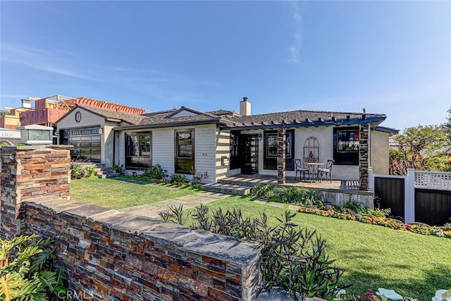 812 8th St, Manhattan Beach, CA 90266 - view of front of property featuring a chimney, a front yard, a garage, and fence