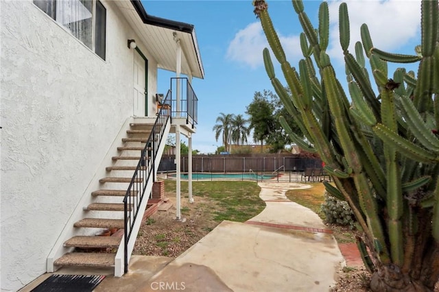 4447 Walnut Ave, Chino, CA 91710 - view of yard featuring a patio, stairs, a fenced in pool, and a fenced backyard