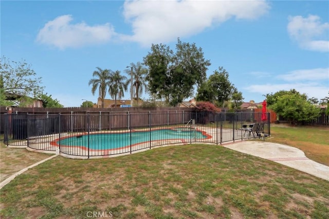 4447 Walnut Ave, Chino, CA 91710 - view of pool featuring a patio, fence, a fenced in pool, and a lawn