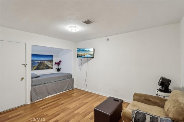 4447 Walnut Ave, Chino, CA 91710 - bedroom with visible vents, baseboards, and light wood-type flooring