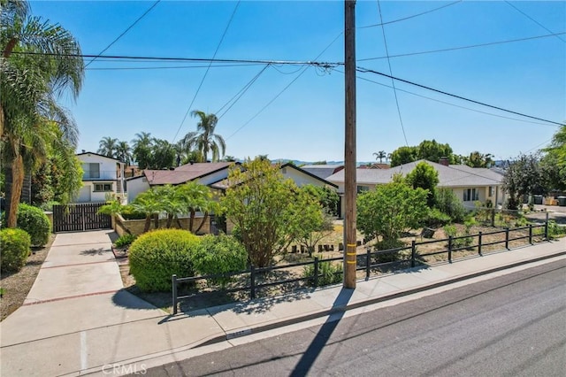4447 Walnut Ave, Chino, CA 91710 - view of front of house with a residential view and fence private yard