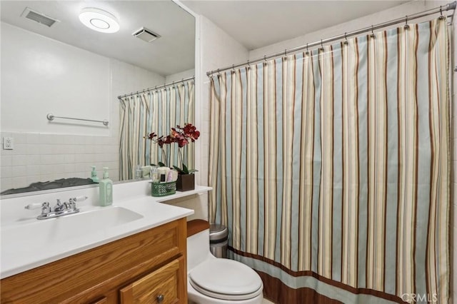 4447 Walnut Ave, Chino, CA 91710 - bathroom featuring visible vents, toilet, and vanity