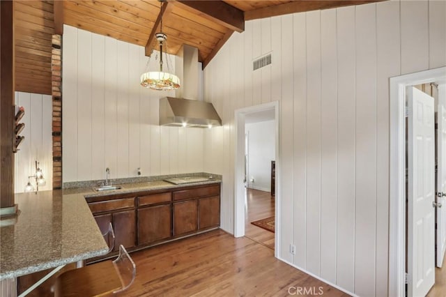 4447 Walnut Ave, Chino, CA 91710 - kitchen with wooden ceiling, vaulted ceiling with beams, light wood-style floors, visible vents, and wall chimney exhaust hood