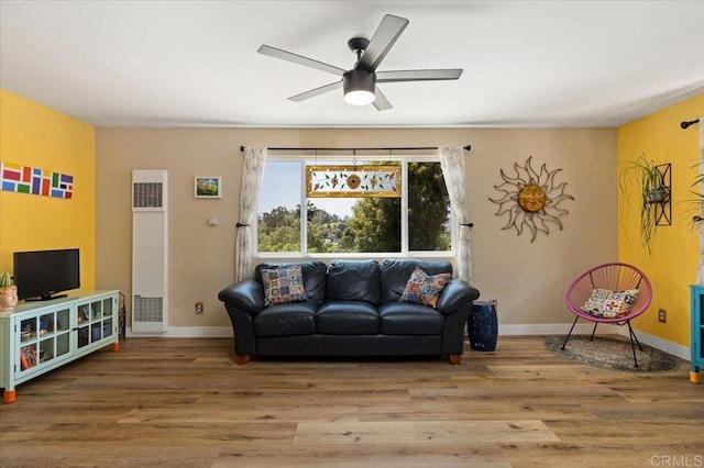 1576 Via Paloma, Escondido, CA 92026 - living area with a heating unit, wood finished floors, ceiling fan, and baseboards