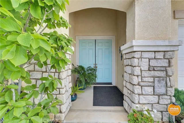 19069 Eldorado Rd, Perris, CA 92570 - view of exterior entry featuring stucco siding and stone siding