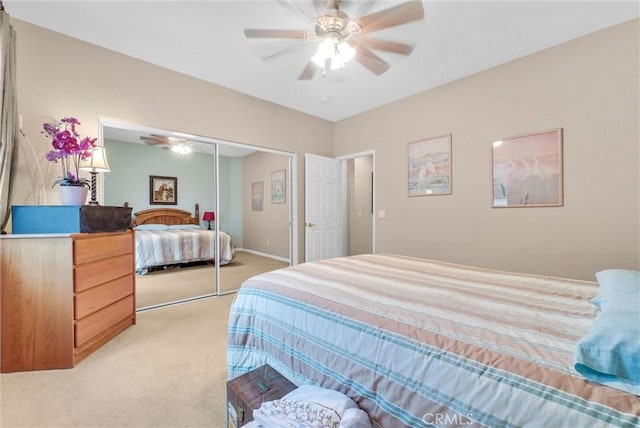 19069 Eldorado Rd, Perris, CA 92570 - bedroom with light carpet, a closet, and a ceiling fan