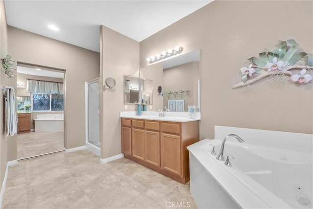 19069 Eldorado Rd, Perris, CA 92570 - bathroom with vanity, a jetted tub, and a shower stall